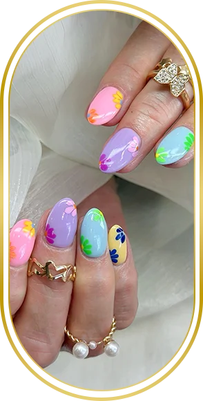 Colorful pastel manicure with purple, green, yellow, and pink nails