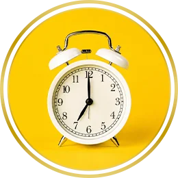 Alarm clock on a bright yellow background